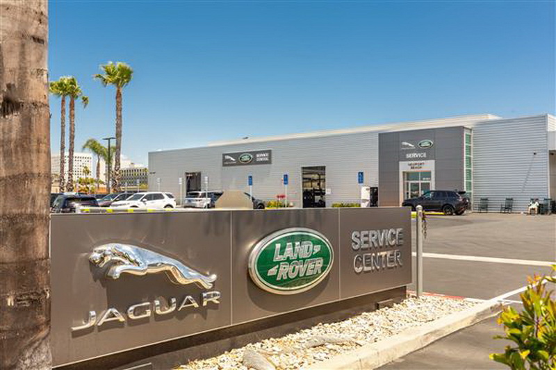 An industrial service building leased to a Jaguar Land Rover service center, part of DMP Properties' industrial portfolio